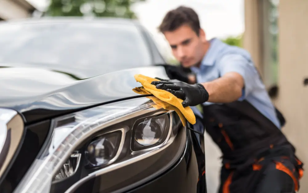 How do you get grease off a car without damaging paint?